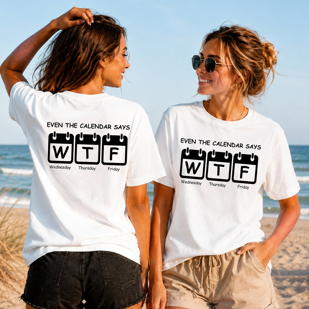 Calendar Says WTF - Women's T-Shirt in white, showing alternative back and front print placements on the beach