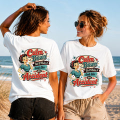 Calm Down - Retro Accident - Women's T-Shirt in white, showing alternative back and front print placements on the beach