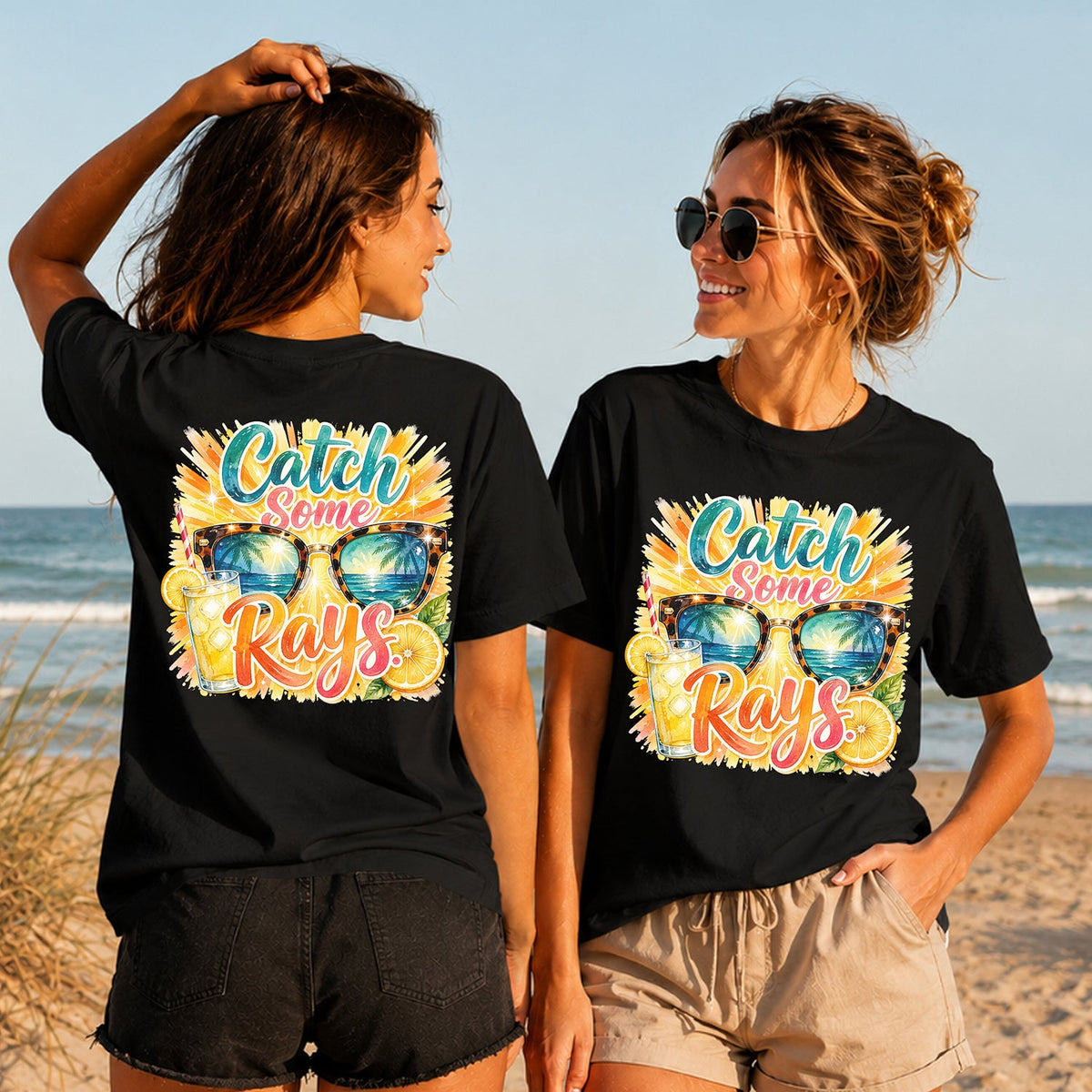Catch Some Rays - Women's T-Shirt in black, showing alternative back and front print placements on the beach