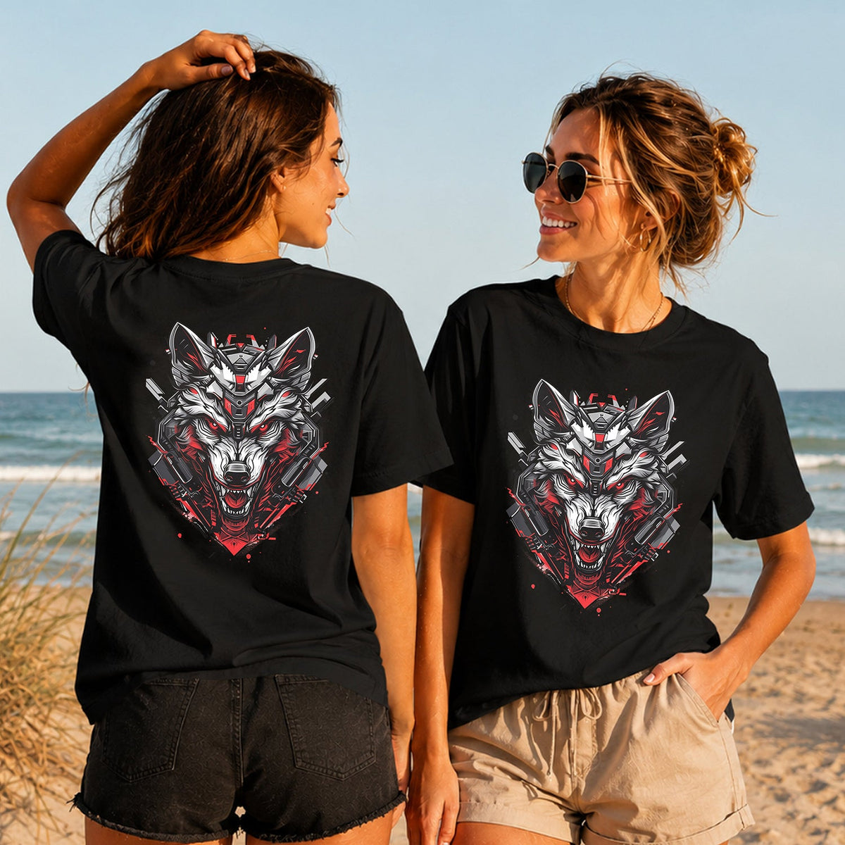 Cybernetic Wolf - Crimson Steel - Women's T-Shirt in black, showing alternative back and front print placements on the beach