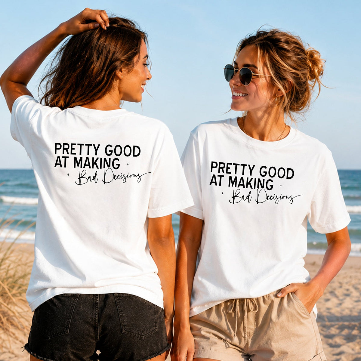 Good at Bad Decisions - Women's T-Shirt in white, showing alternative back and front print placements on the beach