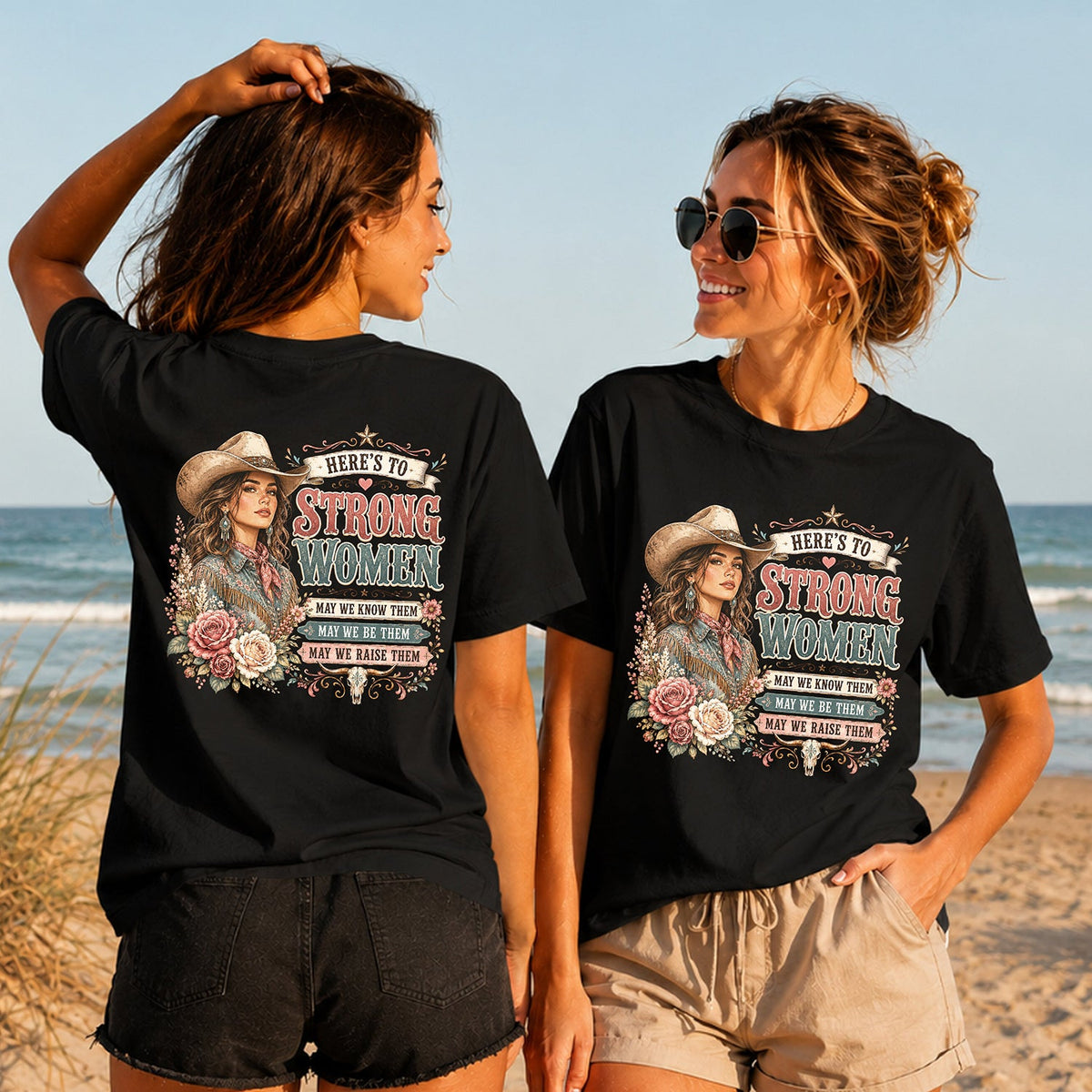 Here's to Strong Women - Women's T-Shirt in black, showing alternative back and front print placements on the beach