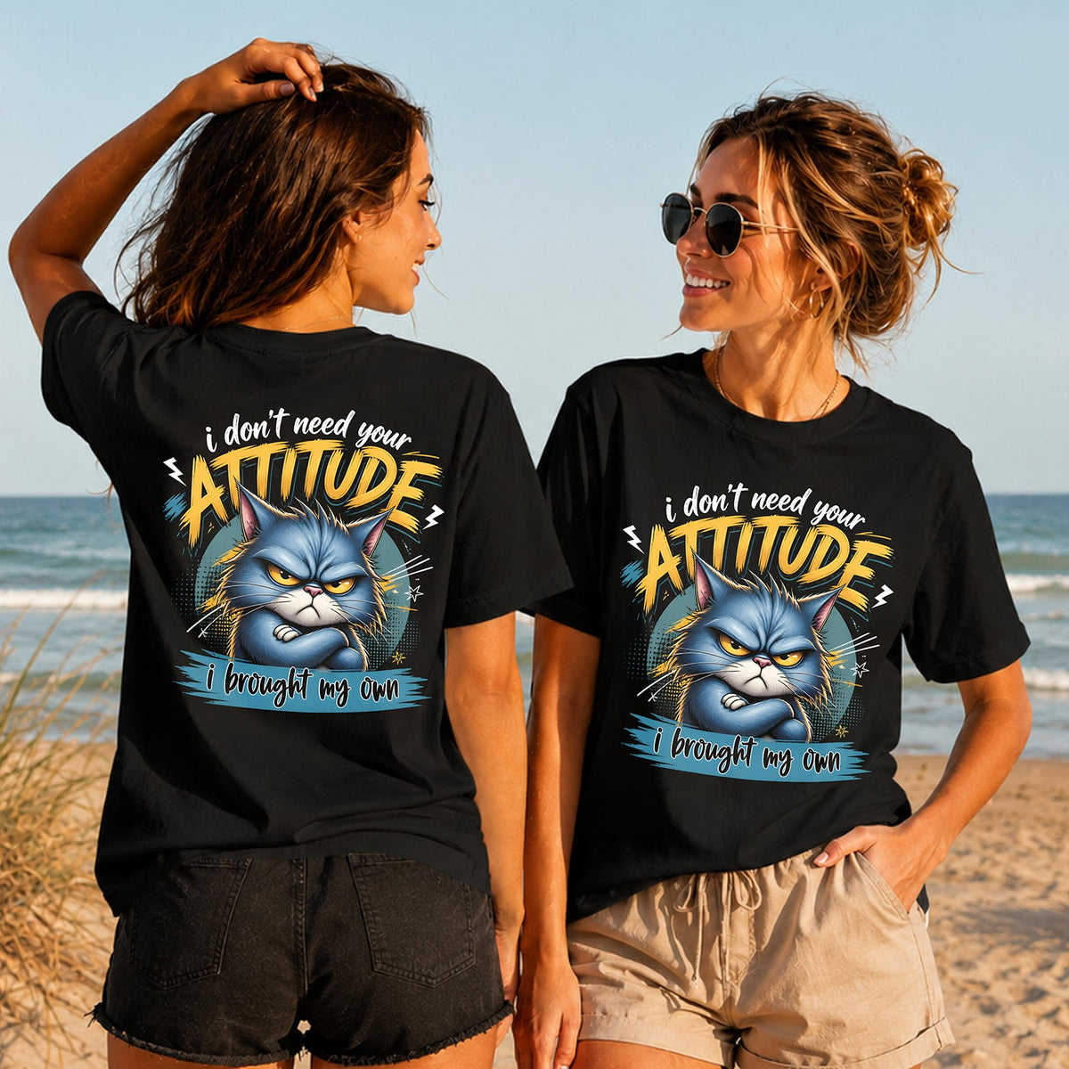 I Brought My Own Attitude - Women's T-Shirt in black, showing alternative back and front print placements on the beach