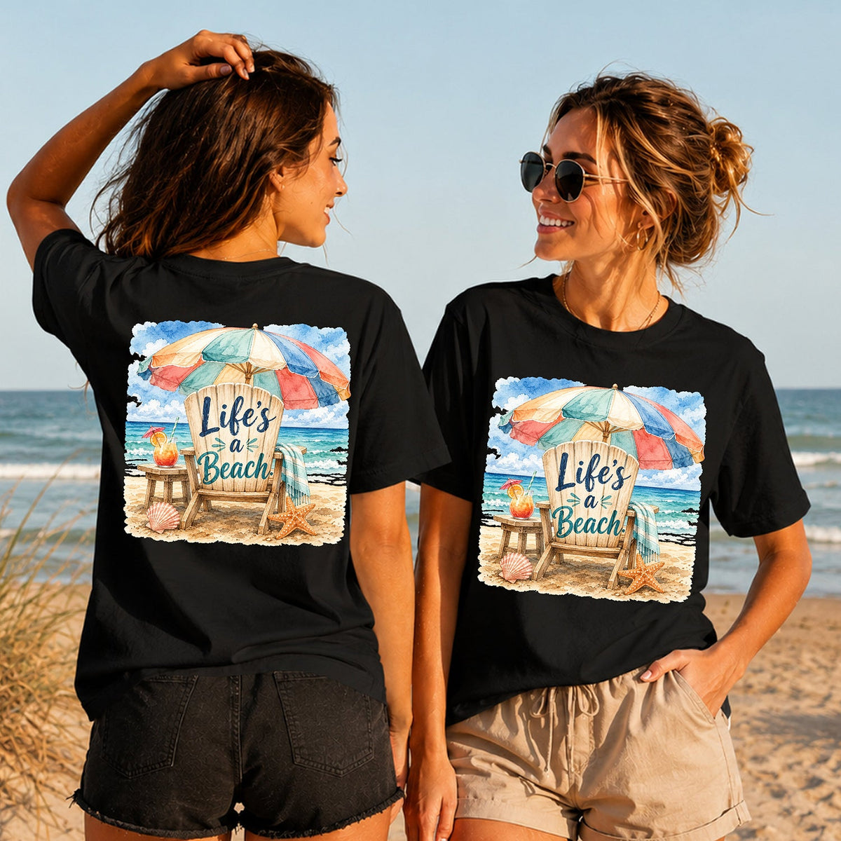 Life's a Beach - Women's T-Shirt in black, showing alternative back and front print placements on the beach