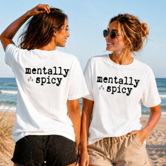 Mentally Spicy - Women's T-Shirt in white, showing alternative back and front print placements on the beach