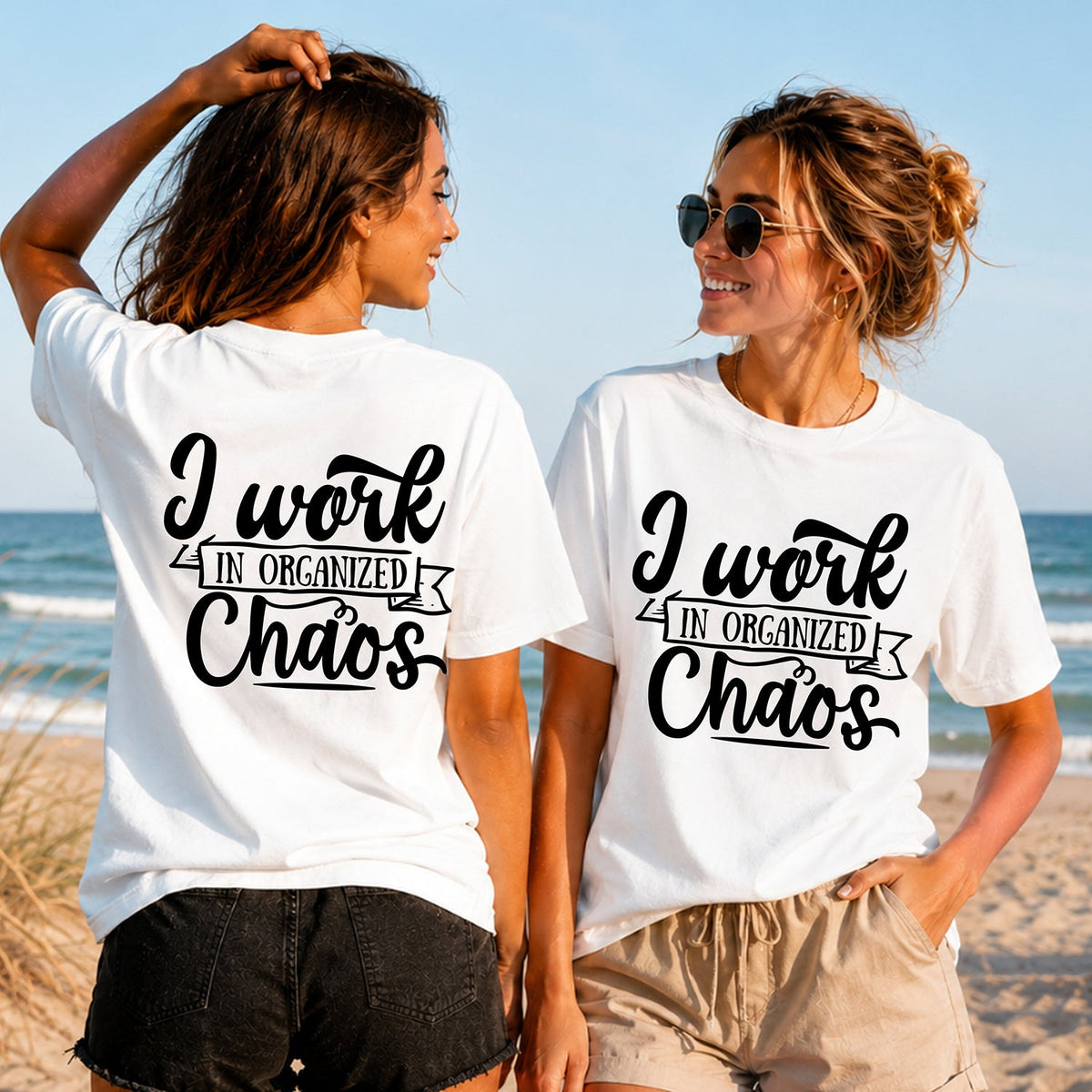 Organised Chaos - Women's T-Shirt in white, showing alternative back and front print placements on the beach