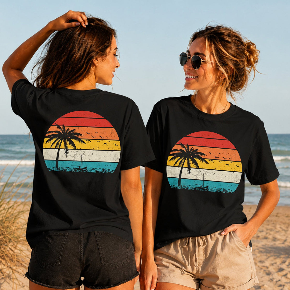Retro Summer Sunset - Women's T-Shirt in black, showing alternative back and front print placements on the beach