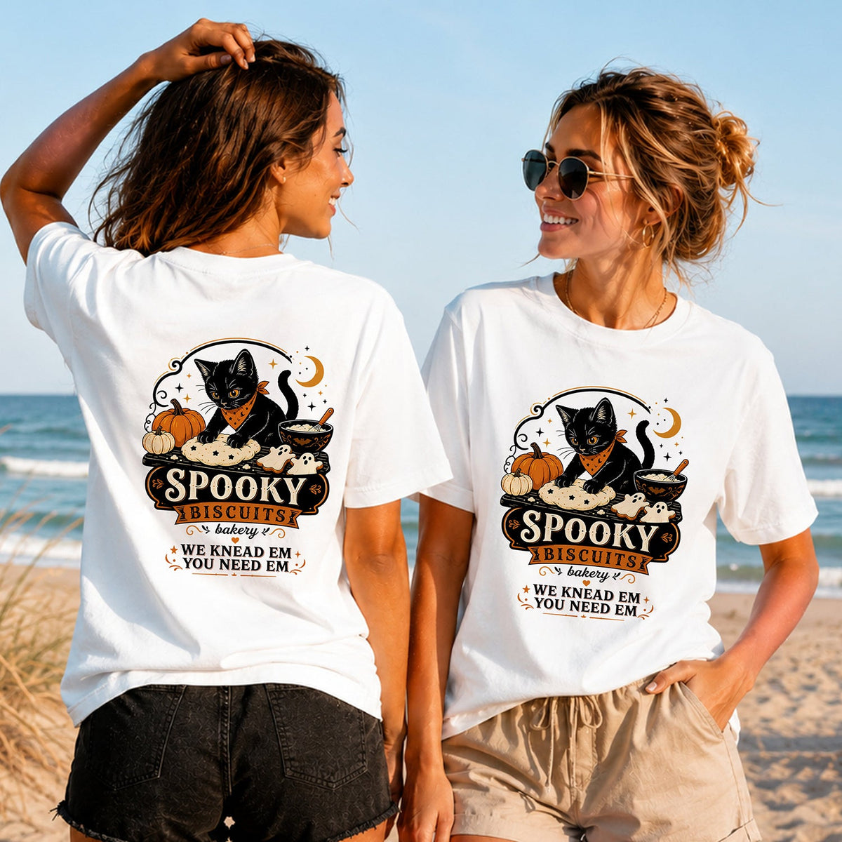 Spooky Biscuits - Moonlight Baker - Women's T-Shirt in white, showing alternative back and front print placements on the beach