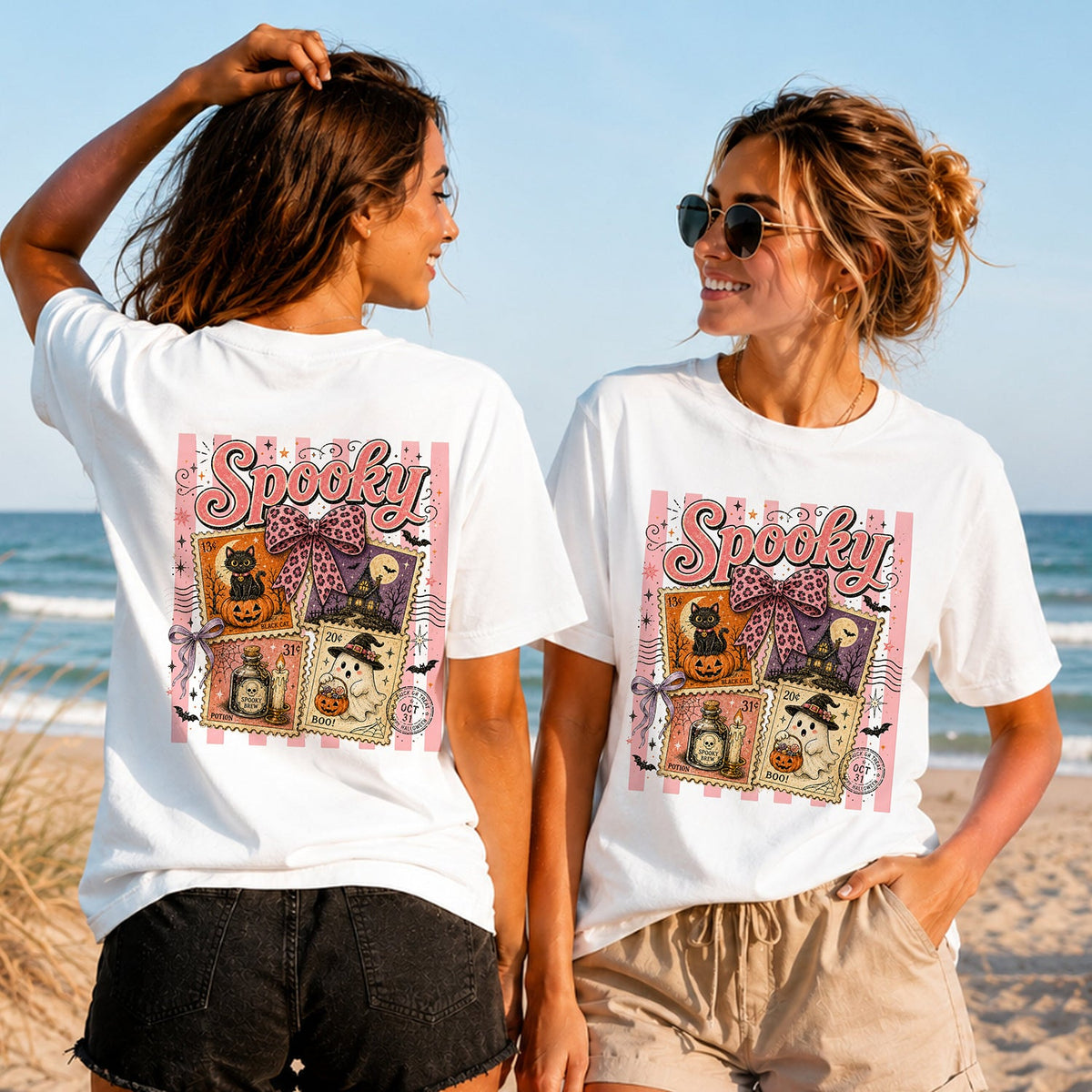 Spooky Postage - Women's T-Shirt in white, showing alternative back and front print placements on the beach