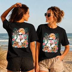 Summerween Beach Ghost - Women's T-Shirt in black, showing alternative back and front print placements on the beach
