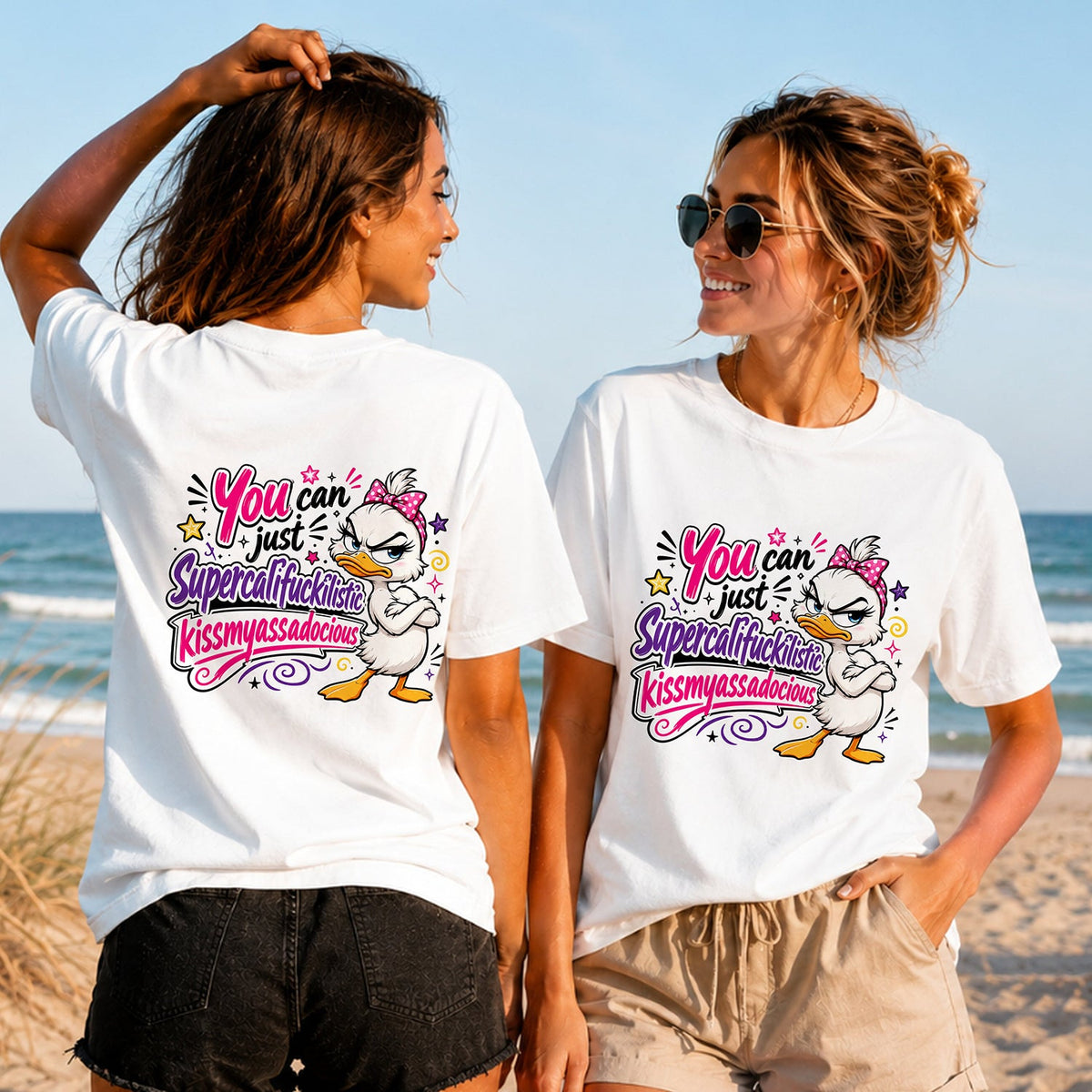 Supercalifuckilistic Duck - Women's T-Shirt in white, showing alternative back and front print placements on the beach