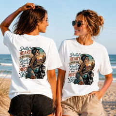 The Roads Are Calling - Women's T-Shirt in white, showing alternative back and front print placements on the beach