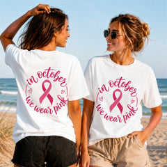 We Wear Pink Cursive Quote 3 - Women's T-Shirt in white, showing front and back print placement choices