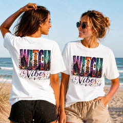 Witch Vibes - Women's T-Shirt in white, showing alternative back and front print placements on the beach