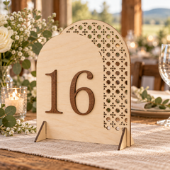Celestial Cascade Arch Table Number in natural ply with dark wood raised number and triangle feet