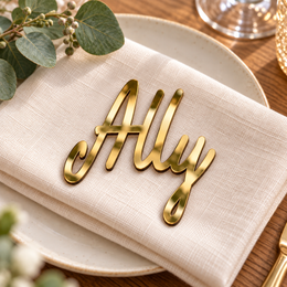 Ally in Bentory Authes font, Mirror Gold Acrylic personalised guest name on an ivory napkin.