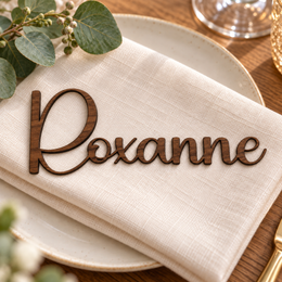 Roxanne in Bridger font, Walnut Varnished Plywood personalised guest name on an ivory napkin.