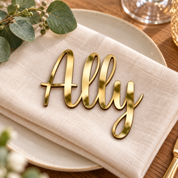 Ally in Relaytemore font, Mirror Gold Acrylic personalised guest name on an ivory napkin.