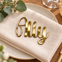 Ally in Writing Monogram font, Mirror Gold Acrylic personalised guest name on an ivory napkin.